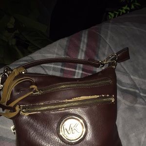 Michael Kors cross body hand bag.